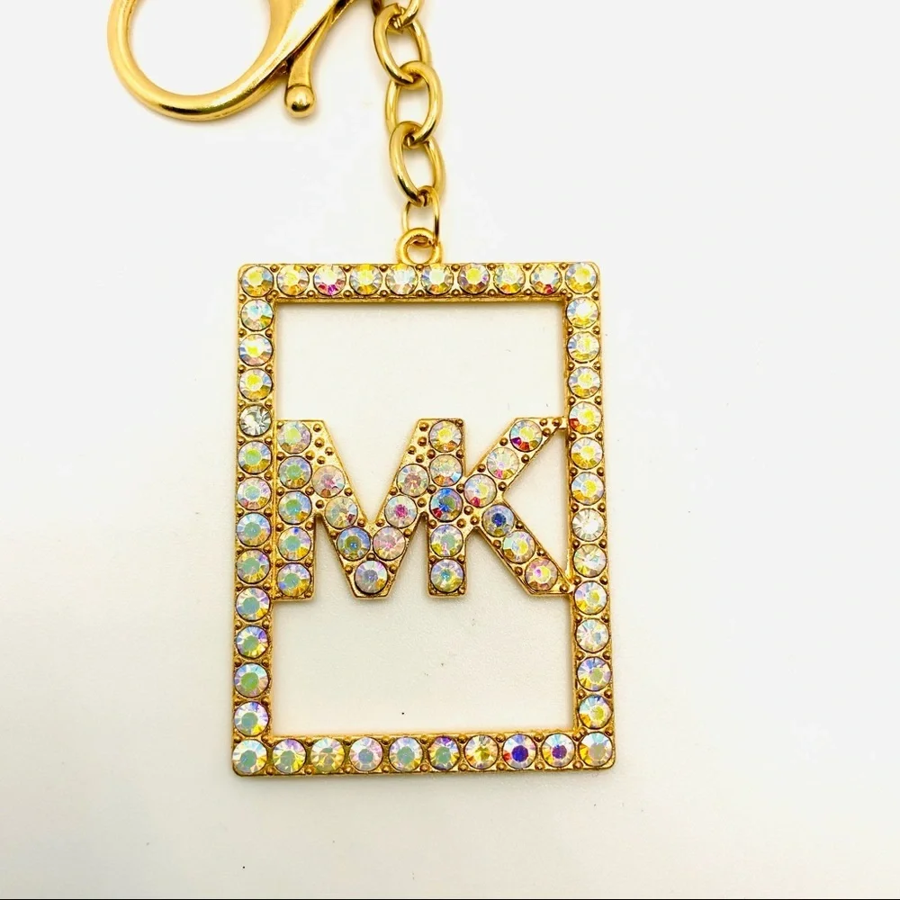 Purse Charm Key Chain MK in Iridescent Crystals set in golden tone. BRAND NEW